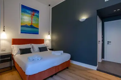 Letto o letti in una camera di Rolando Domus
