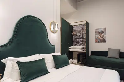 Letto o letti in una camera di Three Rooms Toledo