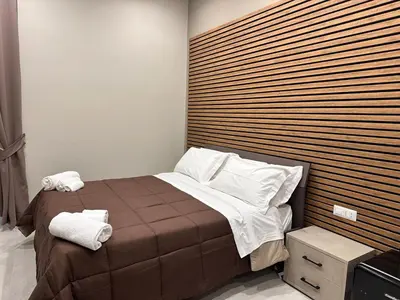 Letto o letti in una camera di DIMORA DEL PLEBISCITO B&b