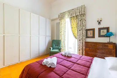 Letto o letti in una camera di Santa Chiara Charming House with Terrace at Historical Center
