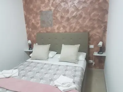 Letto o letti in una camera di Reginahouse