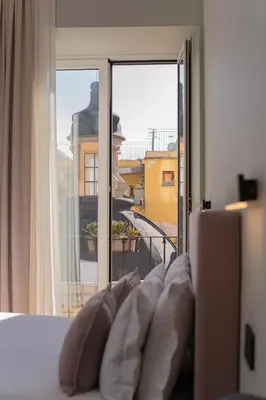 Letto o letti in una camera di Deluxe Spaccanapoli