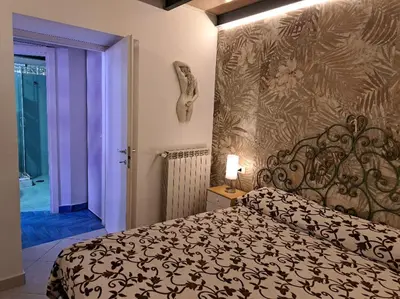 Letto o letti in una camera di Vico Vico