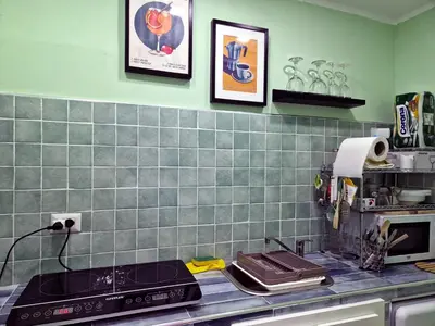 Cucina o angolo cottura di Mithra Apartment Centro Storico