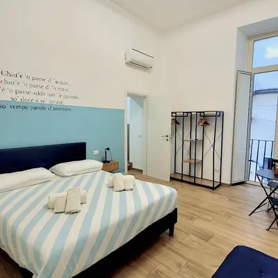 Letto o letti in una camera di Le Stanze Del Poeta Libero Bovio