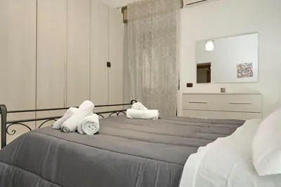 Letto o letti in una camera di Napoli Duomo Center Home