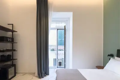 Letto o letti in una camera di InSogno Suites