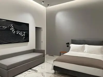 Letto o letti in una camera di InSogno Suites
