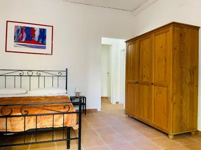 Letto o letti in una camera di Casa vacanza Fermata Napoli Centro