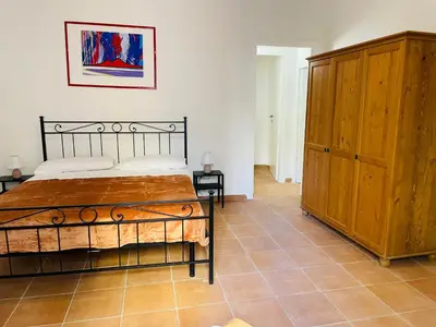 Letto o letti in una camera di Casa vacanza Fermata Napoli Centro