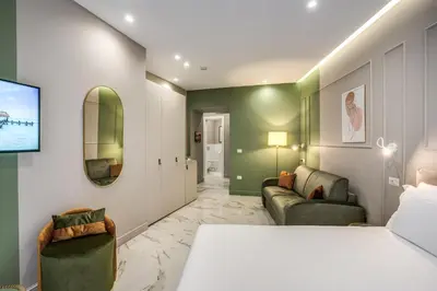 Letto o letti in una camera di The Oasis