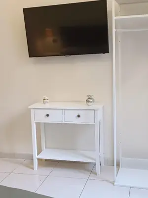 TV o dispositivi per l'intrattenimento presso Residenza GeRi - Suite and Home Napoli Centro
