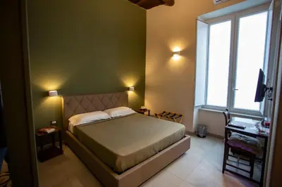 Letto o letti in una camera di Xenia Neapolis