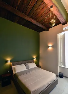 Letto o letti in una camera di Xenia Neapolis
