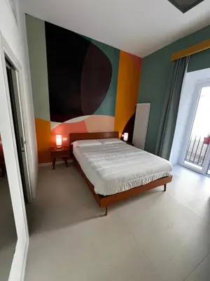 Letto o letti in una camera di Bed & Breakfast SpaccaNapoli 56