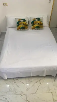 Letto o letti in una camera di Regina House