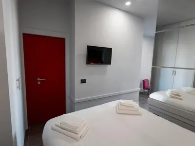 Letto o letti in una camera di Casa Vacanze Bracco 45