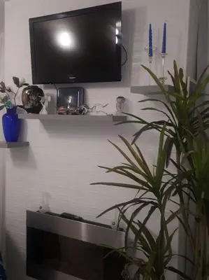 TV o dispositivi per l'intrattenimento presso SOFIA HOUSE living in the heart of Naples