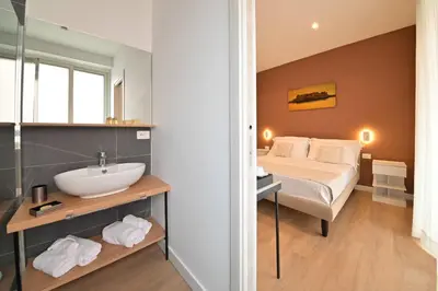Letto o letti in una camera di Ponte di Tappia Suites