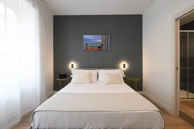 Letto o letti in una camera di Ponte di Tappia Suites