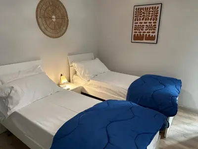 Letto o letti in una camera di Sisella Home- Porto by Napolipopart