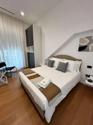 Letto o letti in una camera di Loft Metro Mergellina - Posizione strategica per visitare Napoli