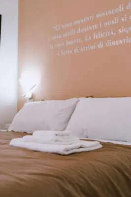 Letto o letti in una camera di GG-Grow - S. Brigida