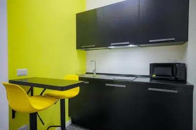 Cucina o angolo cottura di Napoli Games Apartments by Dimorra