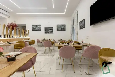 TV o dispositivi per l'intrattenimento presso Hotiday Room Collection - Napoli Sant'Arcangelo