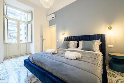 Letto o letti in una camera di Guest House 121 Charming Apartment