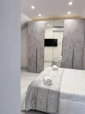 Letto o letti in una camera di Liberato Home