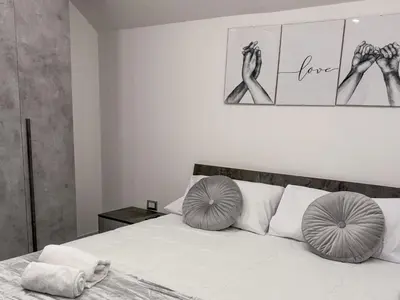 Letto o letti in una camera di Liberato Home