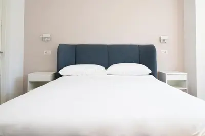 Letto o letti in una camera di Dimora Trecuori