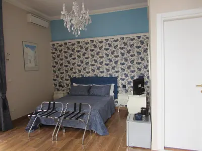 Letto o letti in una camera di Bed and Breakfast Speranzella