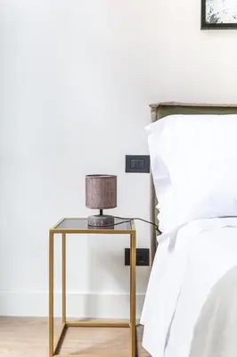 Letto o letti in una camera di La Fontana luxury House By Dimorra