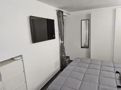 Letto o letti in una camera di Casa Morena, nel cuore di Napoli