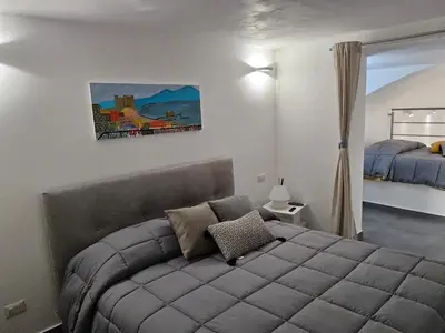Letto o letti in una camera di Casa Morena, nel cuore di Napoli