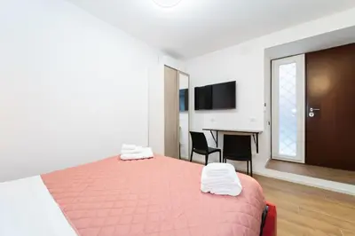Letto o letti in una camera di Vivara - Roots Partenopee