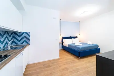 Letto o letti in una camera di Procida - Roots Partenopee