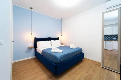 Letto o letti in una camera di Procida - Roots Partenopee