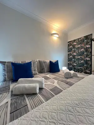 Letto o letti in una camera di Queen house