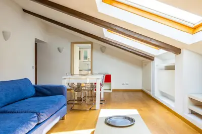 Area soggiorno di Duomo Grand Family Loft