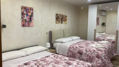 Letto o letti in una camera di Casa Nonna Chicchina