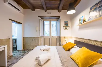 Letto o letti in una camera di Antica Napoli - Cristo Velato home