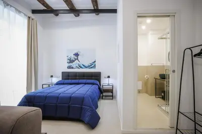 Letto o letti in una camera di Napolidays Rua Catalana Apartment