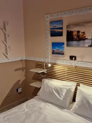 Letto o letti in una camera di casaSofì