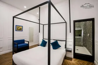 Letto o letti in una camera di Palazzo dei Conti