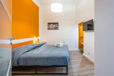 Letto o letti in una camera di Lioy 25 by Napoliapartments