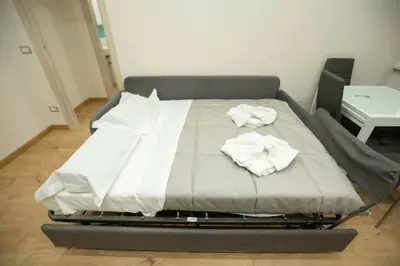Letto o letti in una camera di Don Cozzolino Apartment