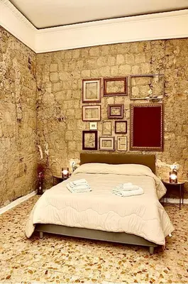 Letto o letti in una camera di La Dimora di Mary
